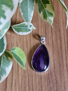  a purple teardrop-shaped amethyst pendant www.karmaripon.co.uk