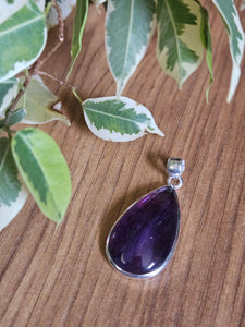  a purple teardrop-shaped amethyst pendant www.karmaripon.co.uk