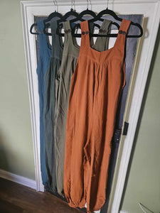 Four coloured overalls/ dungarees 
www.karmaripon.co.uk