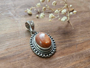 Sun Stone Pendant www.karmaripon.co.uk