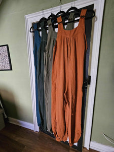Four coloured overalls/ dungarees 
www.karmaripon.co.uk