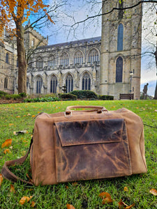 Leather over night duffel bag www.karmaripon.co.uk