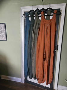 Four coloured overalls/ dungarees 
www.karmaripon.co.uk