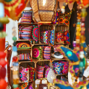 Our cushion wall in the shop. www.karmaripon.co.uk