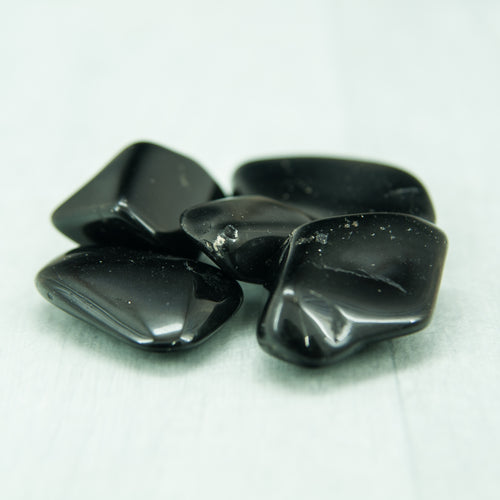 Black Tourmaline Tumble Stone www.karmaripon.co.uk